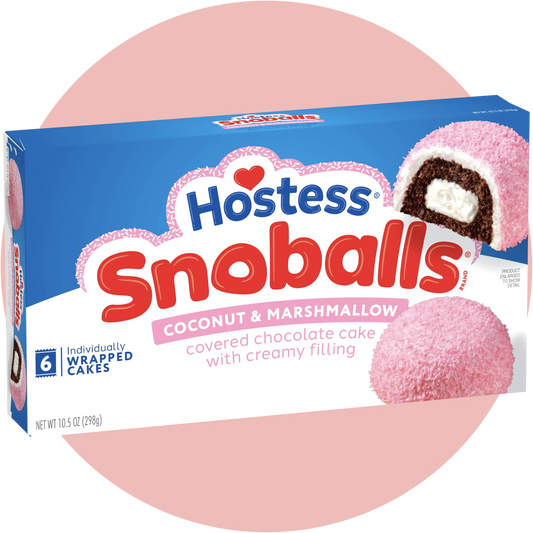 Hostess Snoballs in neuer Verpackung – weiche Schokokuchen mit cremiger Füllung und Kokosüberzug, der bekannte Klassiker aus den USA.