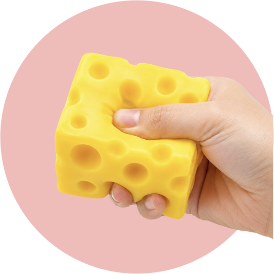 Käse Squishy mit typischen Käselöchern als weiches Anti-Stress-Spielzeug